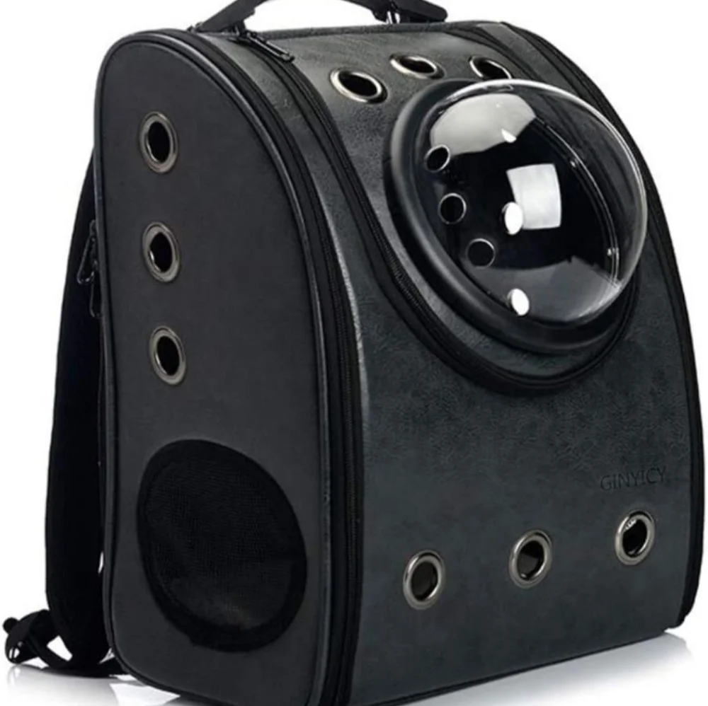 Waterproof pet carrier with bubble port.